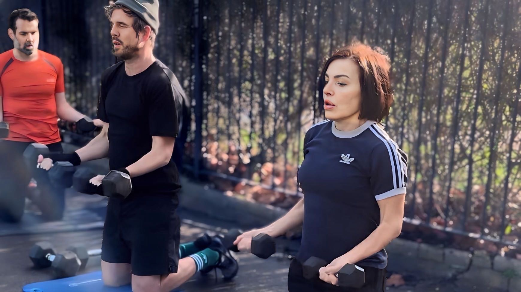 Dumbbell group training outdoors